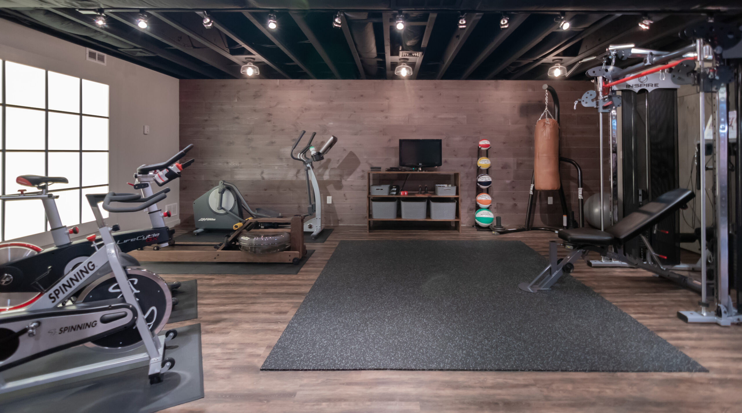 Finished basement family room by Masters Touch Design Build