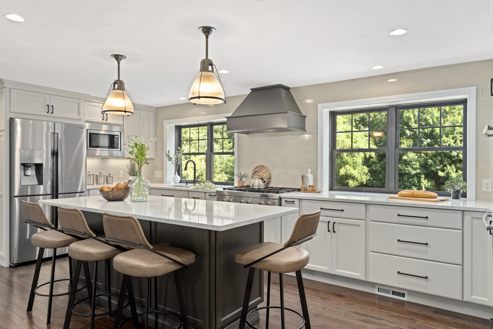 Kitchen remodel with island seating and premium countertops