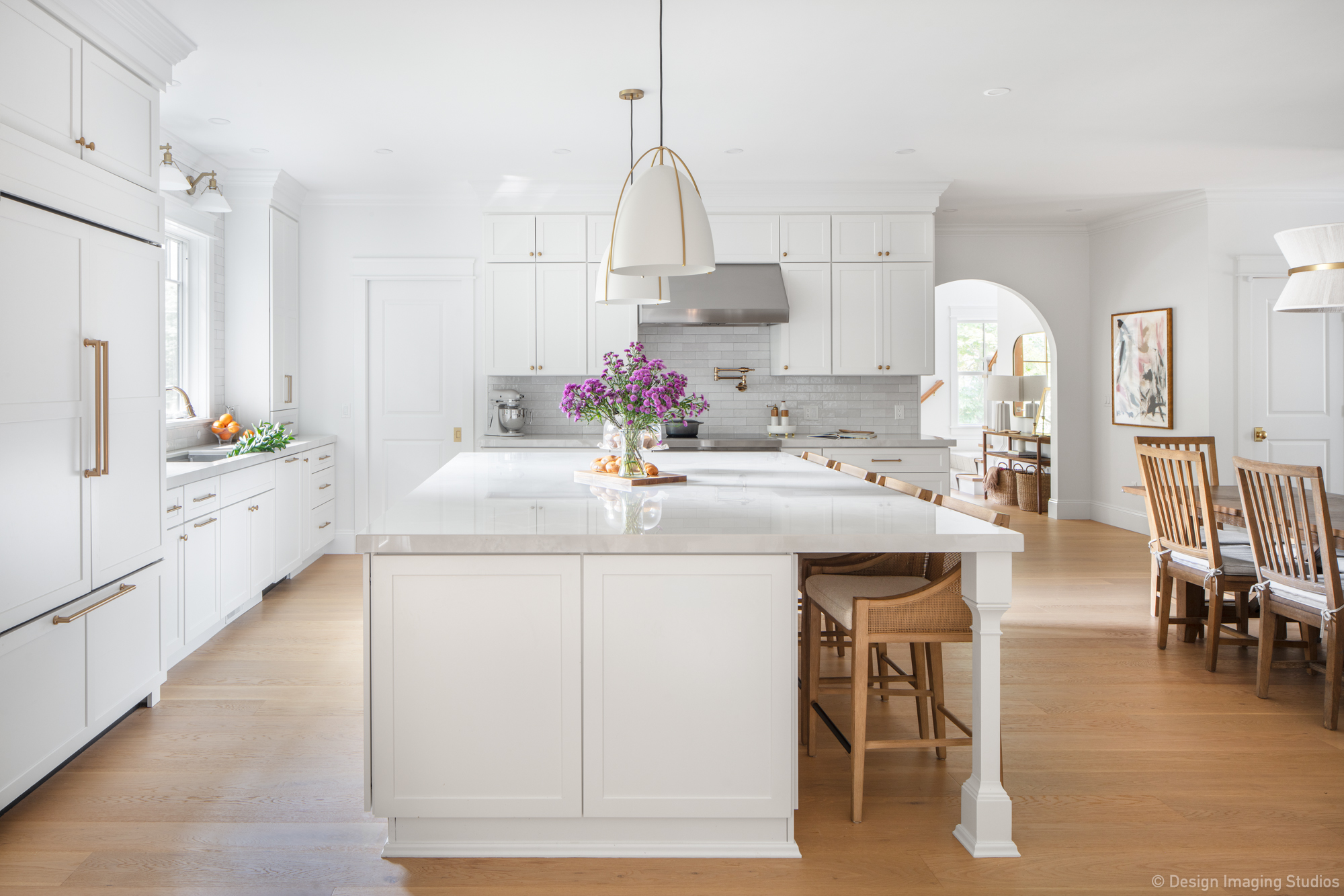 Kitchen remodel in Wayland, MA with island seating and premium countertops
